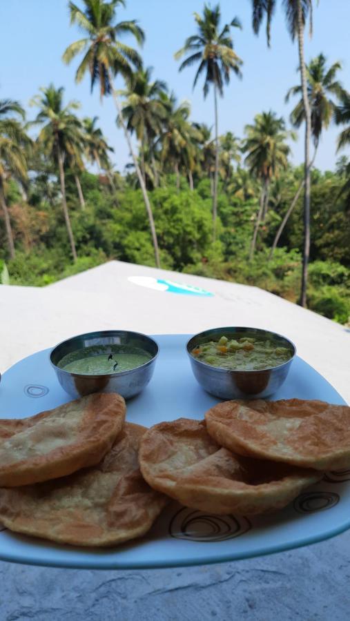 Tropical Wave Hostel Morjim Goa Exterior foto